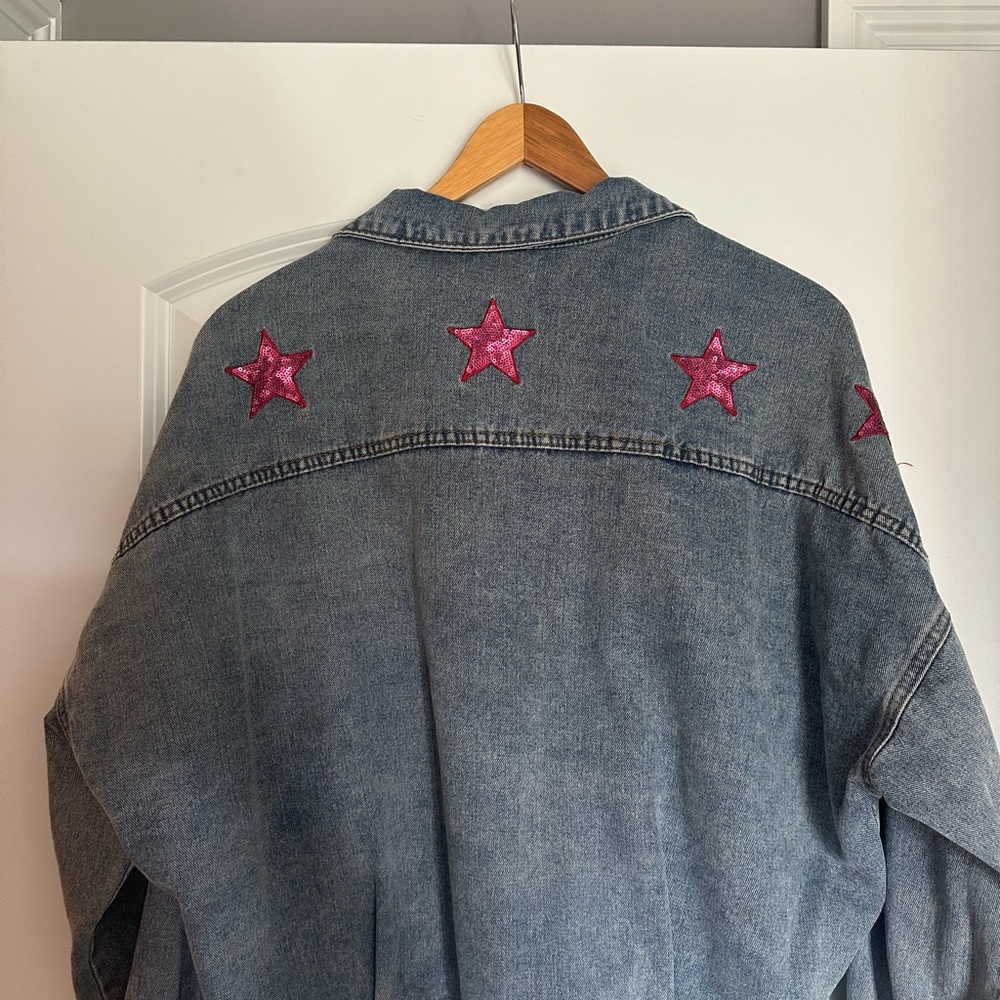 Oversized denim jacket with pink star appliqués. Veveret brand. Size M.